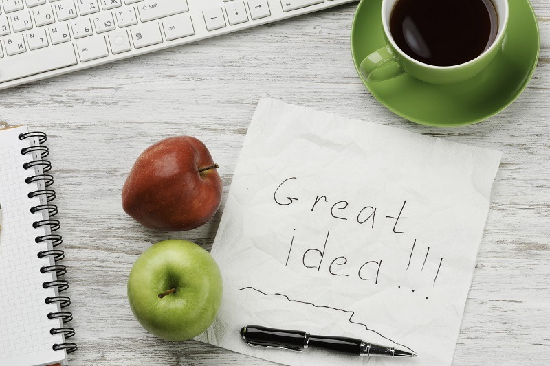 Desk with a pen paper and napkin